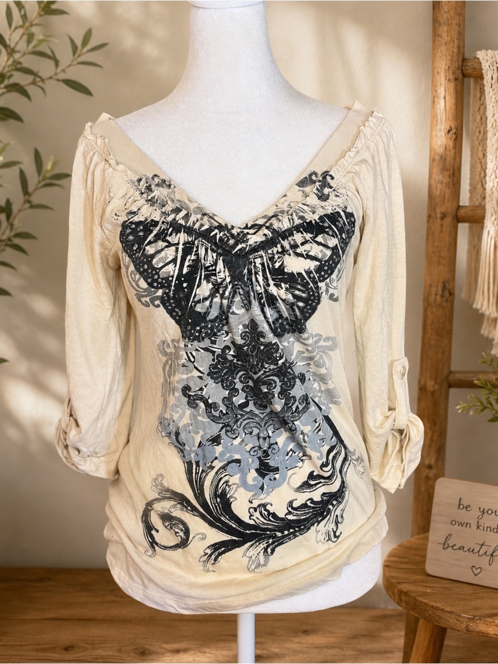 Cream Long-Sleeve V-Neck Top with Black Butterfly Print